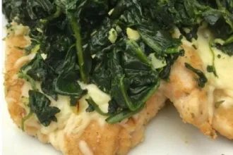 Close up view of Mozzarella Chicken with Garlic Spinach