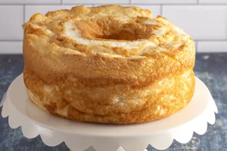 PICT RECIPE Pineapple Angel Food Cake - USDA Serving plate with a pineapple angel food cake
