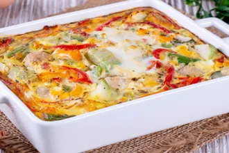 PICT RECIPE Polenta with Pepper and Cheese - USDA Ceramic baking dish of polenta with pepper and cheese.