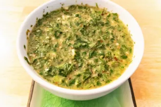 Chimichurri Sauce - USDA Overhead view of a bowl of chimichurri sauce.