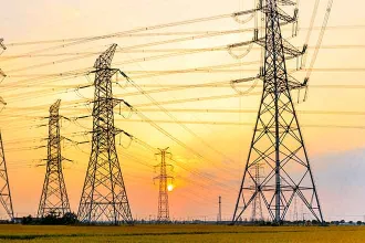 PROMO 64J1 Energy - Power Lines Sky Sunset Clouds High Voltages - iStock - zhaojiankang